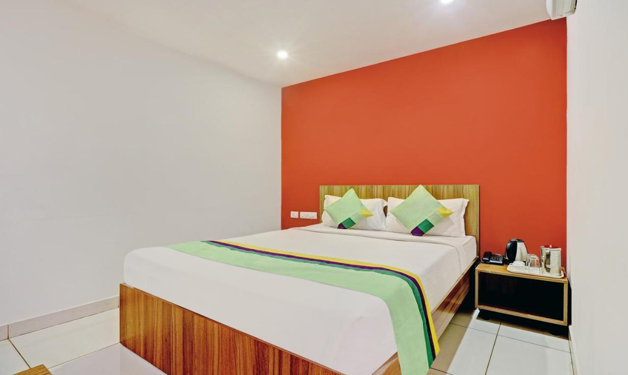 Treebo Sai Suites Inn Nagavara Bangalore Esterno foto